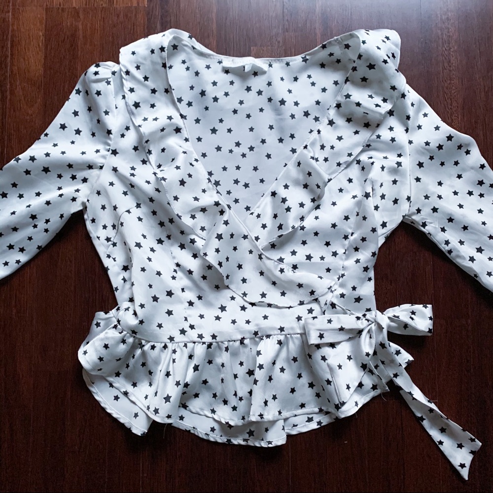 Silky star patterned wrap blouse